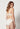 Rückansicht von einem Damen-Model, das HU ivory mikrofaser Push-up BH trägt