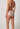 Rückansicht von einem Damen-Model, das HU dusty rose mikrofaser Maxi Slip trägt