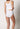 Rückansicht von einem Damen-Model, das HU white baumwolle Midi Slip Doppelpack trägt