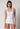 Vorderansicht von einem Damen-Model, das HU white baumwolle Tanktop Doppelpack trägt