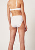 Rückansicht von einem Damen-Model, das HU white baumwolle Maxi Slip Doppelpack trägt
