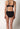 Rückansicht von einem Damen-Model, das HU black baumwolle Midi Slip Doppelpack trägt