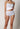 Vorderansicht von einem Damen-Model, das HU white baumwolle Maxi Slip 4er Pack trägt
