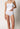 Vorderansicht von einem Damen-Model, das HU white baumwolle Maxi Slip trägt