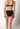 Rückansicht von einem Damen-Model, das HU black mikrofaser Rio Slip Doppelpack trägt
