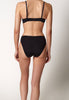 Rückansicht von einem Damen-Model, das HU black mikrofaser Rio Slip Doppelpack trägt