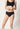 Vorderansicht von einem Damen-Model, das HU black mikrofaser Rio Slip trägt