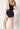Rückansicht von einem Damen-Model, das HU black mikrofaser Maxi Slip trägt