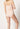 Rückansicht von einem Damen-Model, das HU dusty rose mikrofaser Maxi Slip trägt