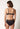 Rückansicht von einem Damen-Model, das HU black mikrofaser Push-up BH trägt
