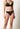 Vorderansicht von einem Damen-Model, das HU black mikrofaser String trägt