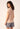 Rückansicht von einem Damen-Model, das HU dusty rose modal/viskose/tencel Shirt kurzarm trägt