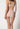 Rückansicht von einem Damen-Model, das HU dusty rose mikrofaser Taillien Slip trägt