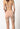 Rückansicht von einem Damen-Model, das HU nude modal/viskose/tencel Pants langes Bein trägt