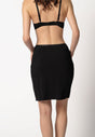 Rückansicht von einem Damen-Model, das HU black modal/viskose/tencel Unterrock trägt