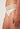 Nahaufnahme von einem Damen-Model, das HU whisper white mikrofaser Rio Slip trägt