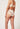 Rückansicht von einem Damen-Model, das HU whisper white mikrofaser Maxi Slip trägt