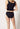 Rückansicht von einem Damen-Model, das HU black modal/viskose/tencel Rio Slip trägt