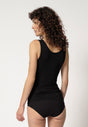 Rückansicht von einem Damen-Model, das HU black modal/viskose/tencel Tanktop trägt
